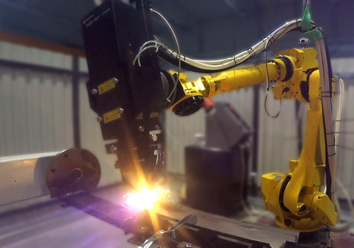 Robotic Laser Cladding for Additive Manufacturing