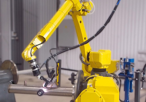 Robot for welding oil samplers