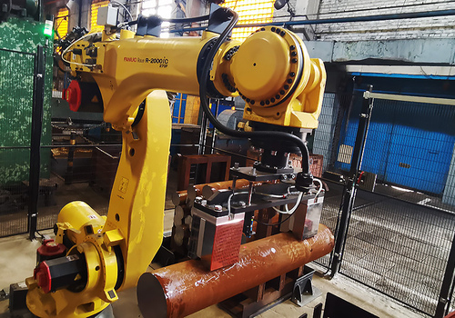 Robotic Loading and Unloading AMADA cutting machine
