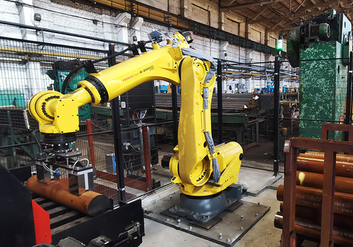 Robotic Loading and Unloading AMADA cutting machine