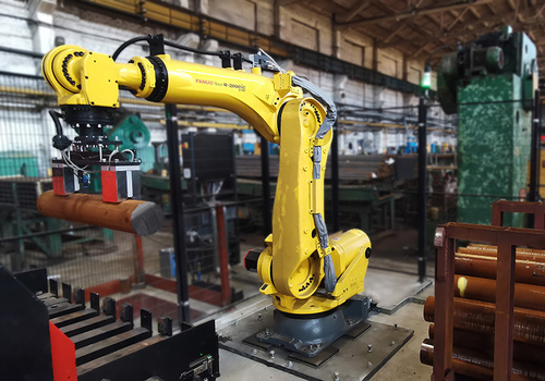 Robotic Loading and Unloading AMADA cutting machine